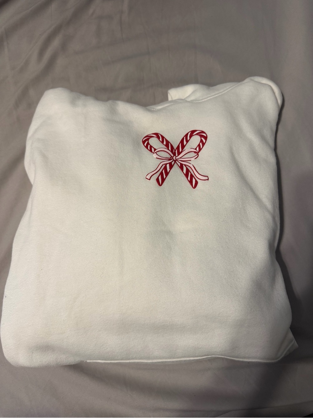 Hollister White Sweatshirt with Red Candy Cane Bow Graphic